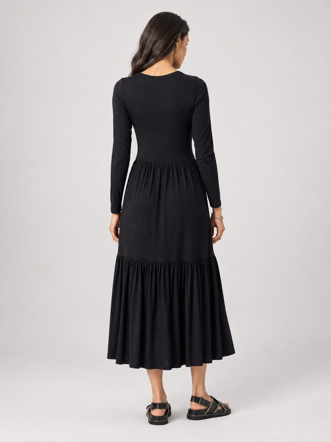 Black long sleeve tiered jersey midi dress — back view