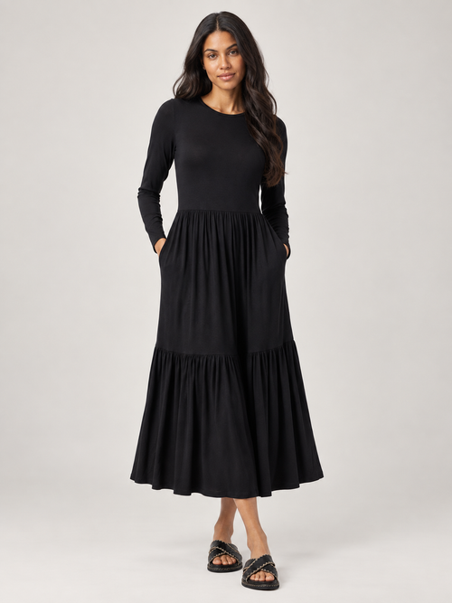 Black long sleeve tiered jersey midi dress — front view