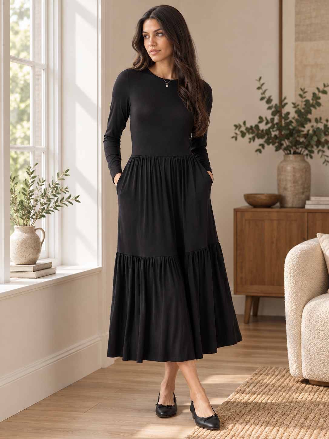 Black long sleeve tiered jersey midi dress — lifestyle view