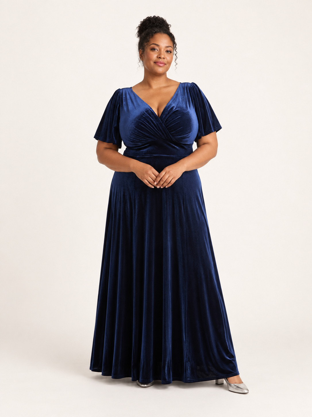 Front view of navy velvet maxi dress with angel sleeves