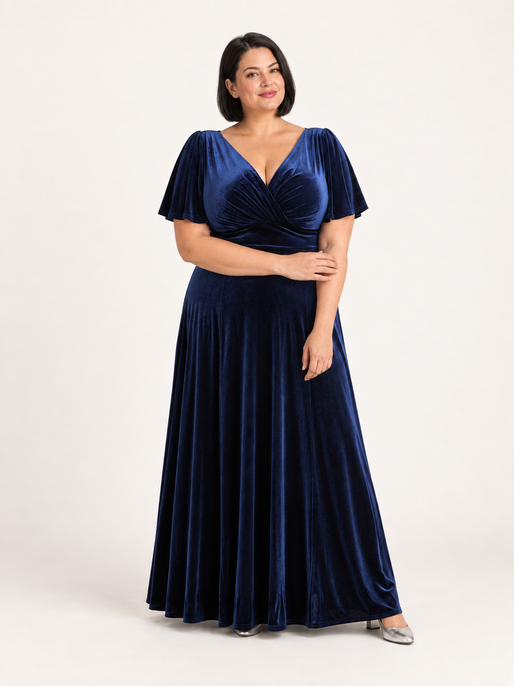 Navy velvet maxi dress shown on a second model