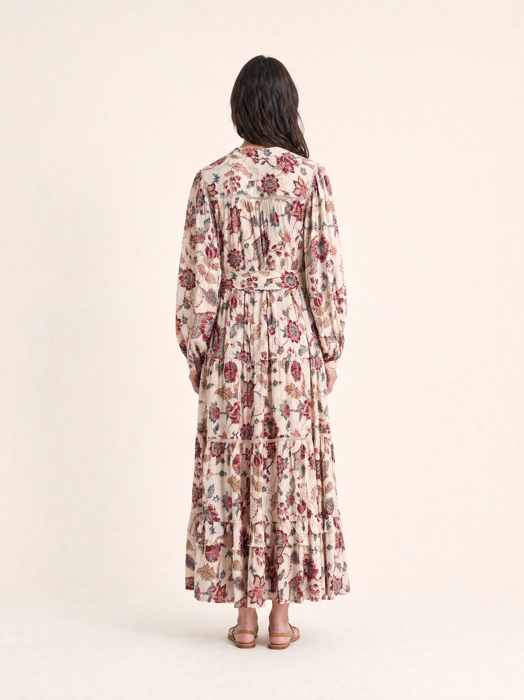 Back view of the cream floral tiered midi dress showing the lace-trimmed yoke
