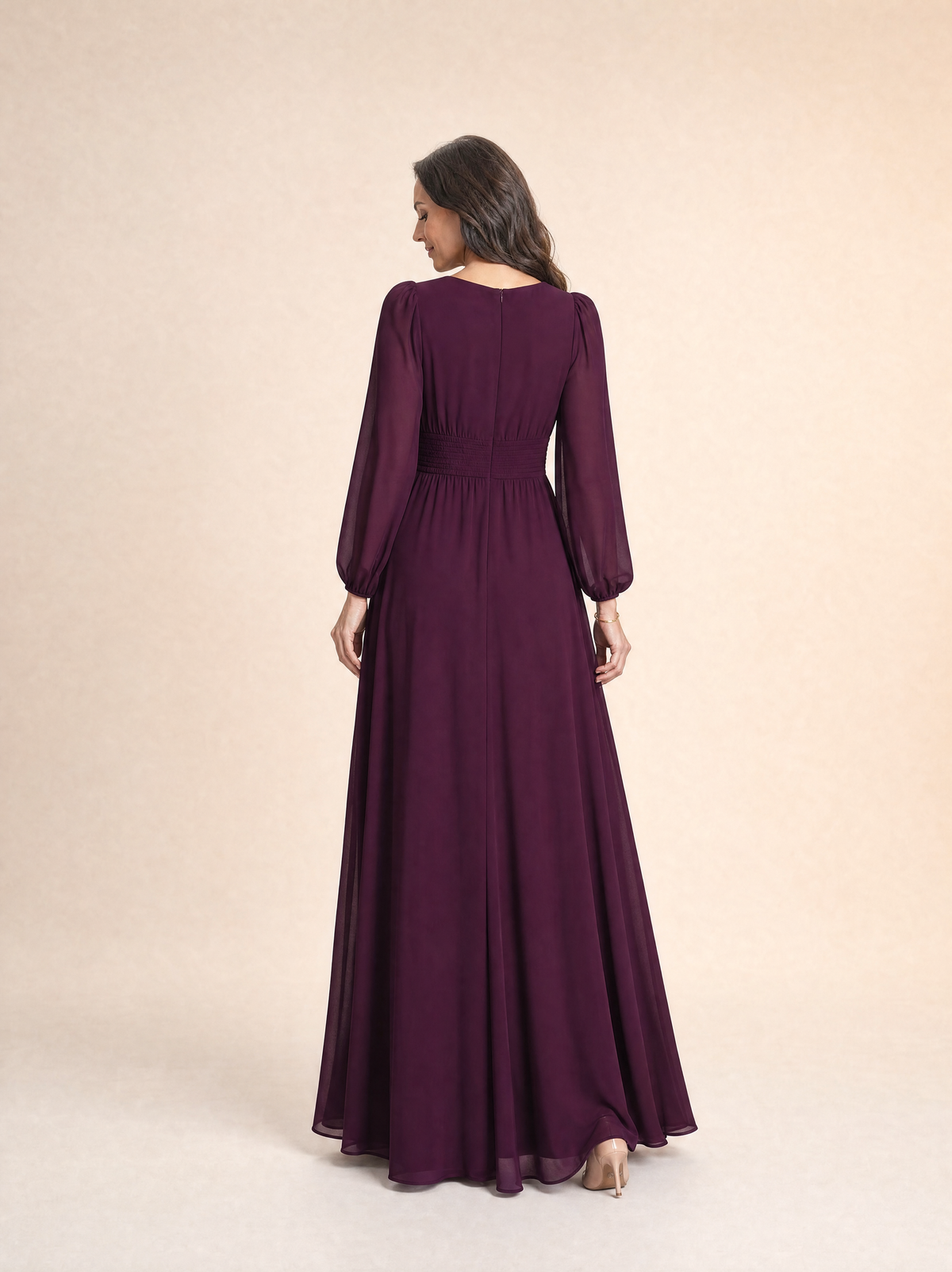Back view of the mulberry chiffon maxi dress, showing the full bishop sleeves and the long A-line skirt