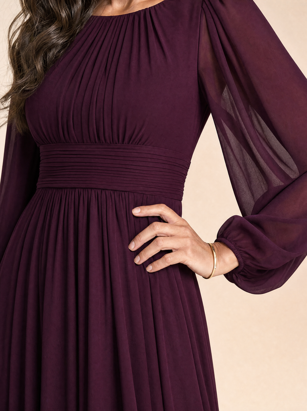 Close detail of the horizontally pleated waistband, the gathered bodice and the elasticated sheer cuff