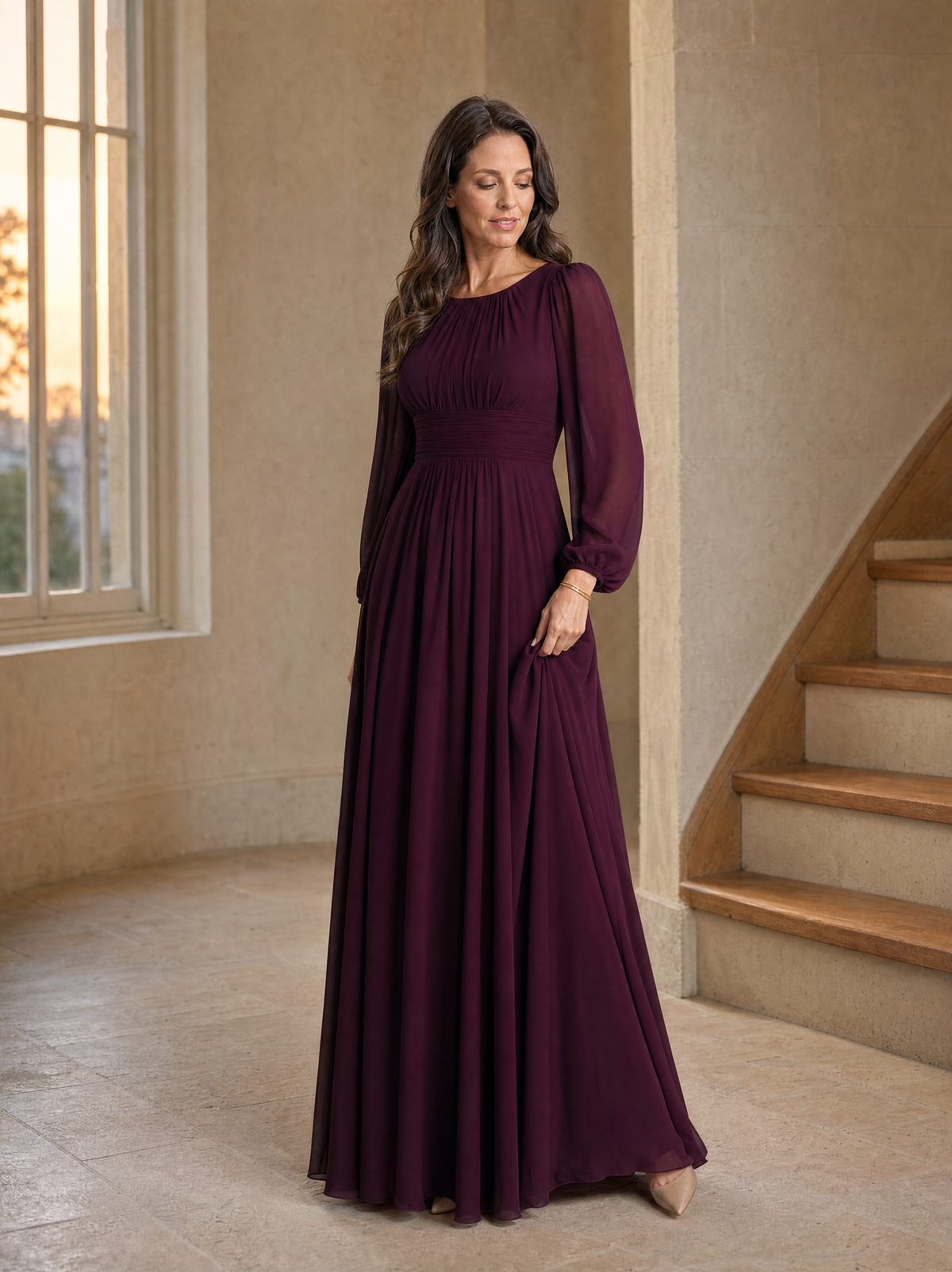 The mulberry chiffon maxi dress worn in a stone entrance hall at early evening
